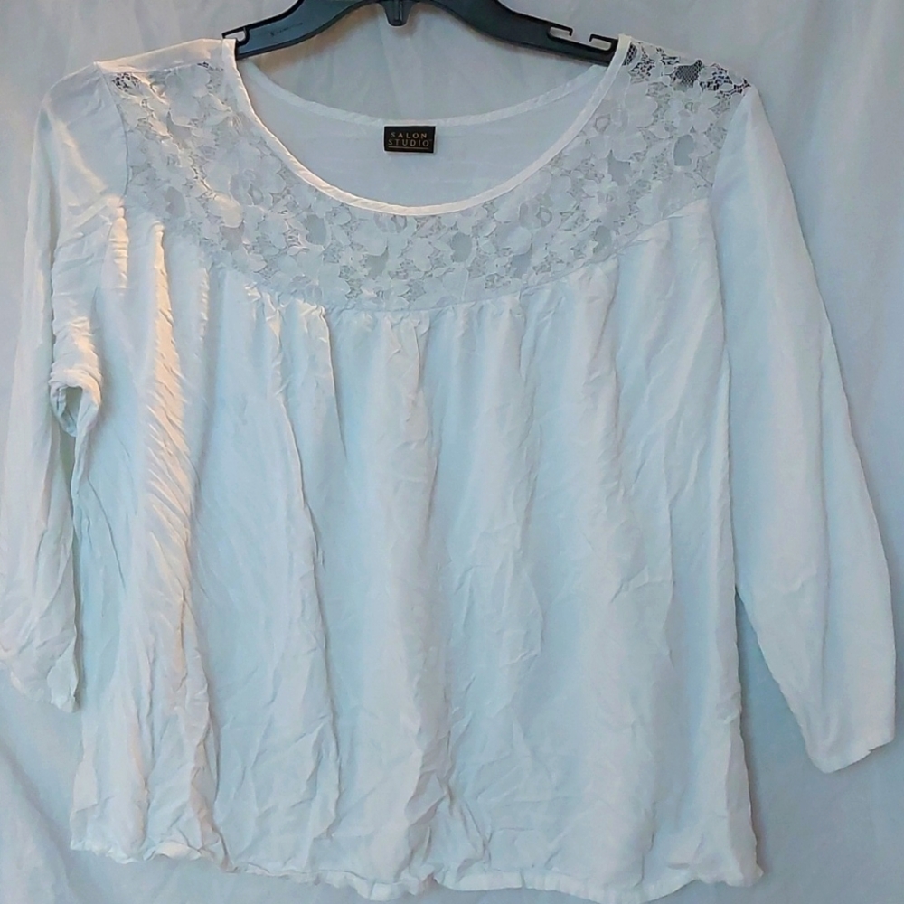 Salon Studio White long sleeve blouse with lace around the neck.